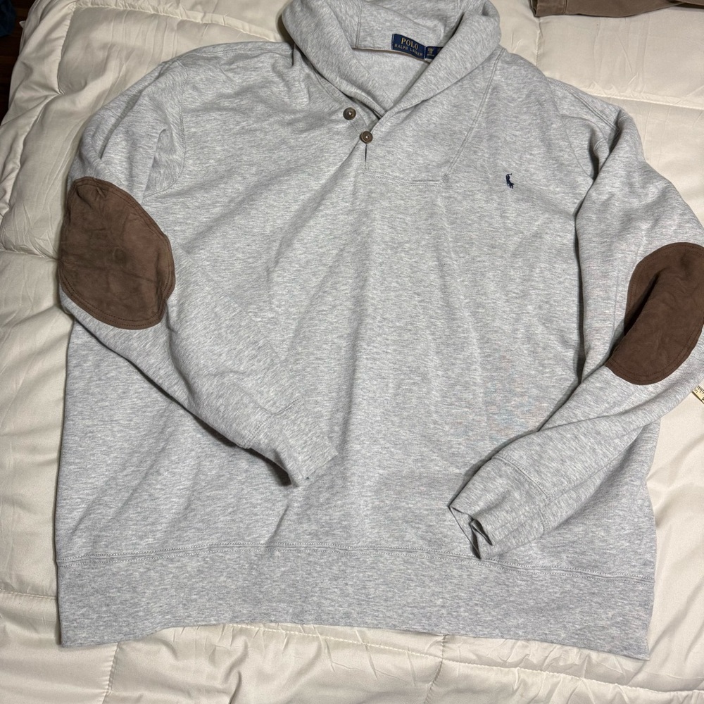 Ralph Lauren Polo sweatshirt with button neck and brown suede elbow patches.